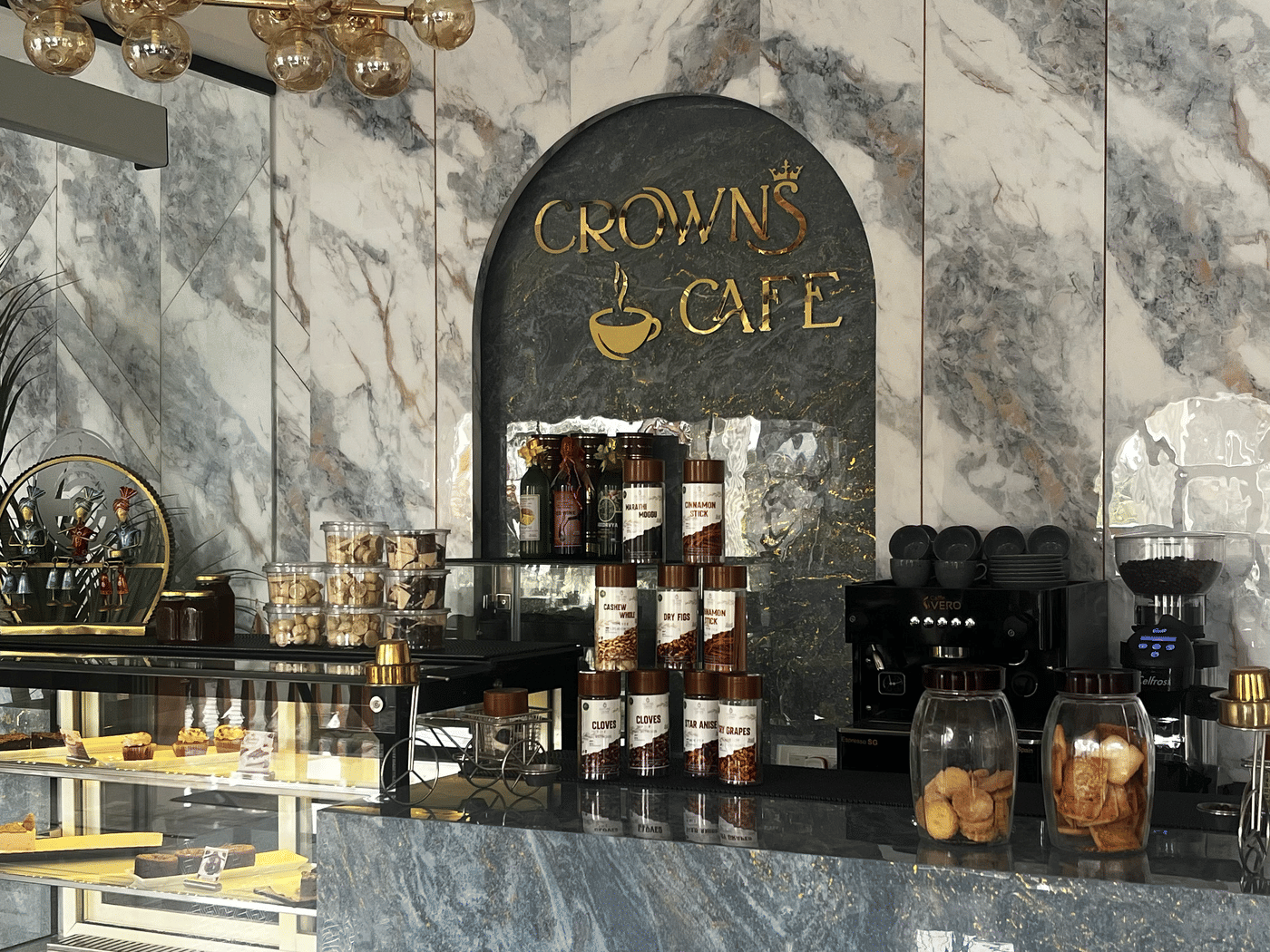 The marble counter and gold Crown Cafe sign