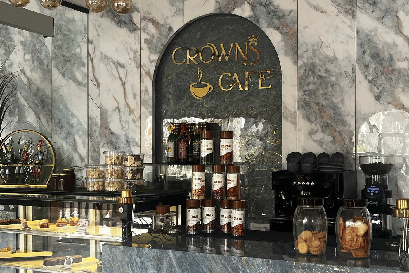 The marble counter and gold Crown Cafe sign