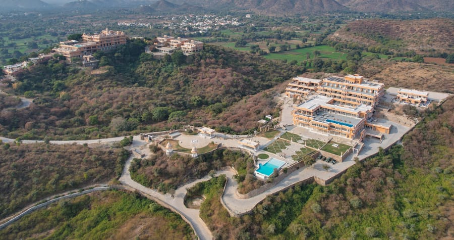 Aerial view of Fateh Vilas Udaipur resort amid the Aravalli Hills