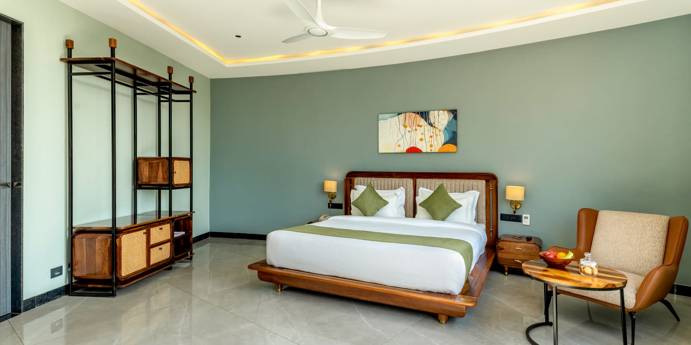 Pool View Room and exterior grounds at The Qualia Resort, Udaipur