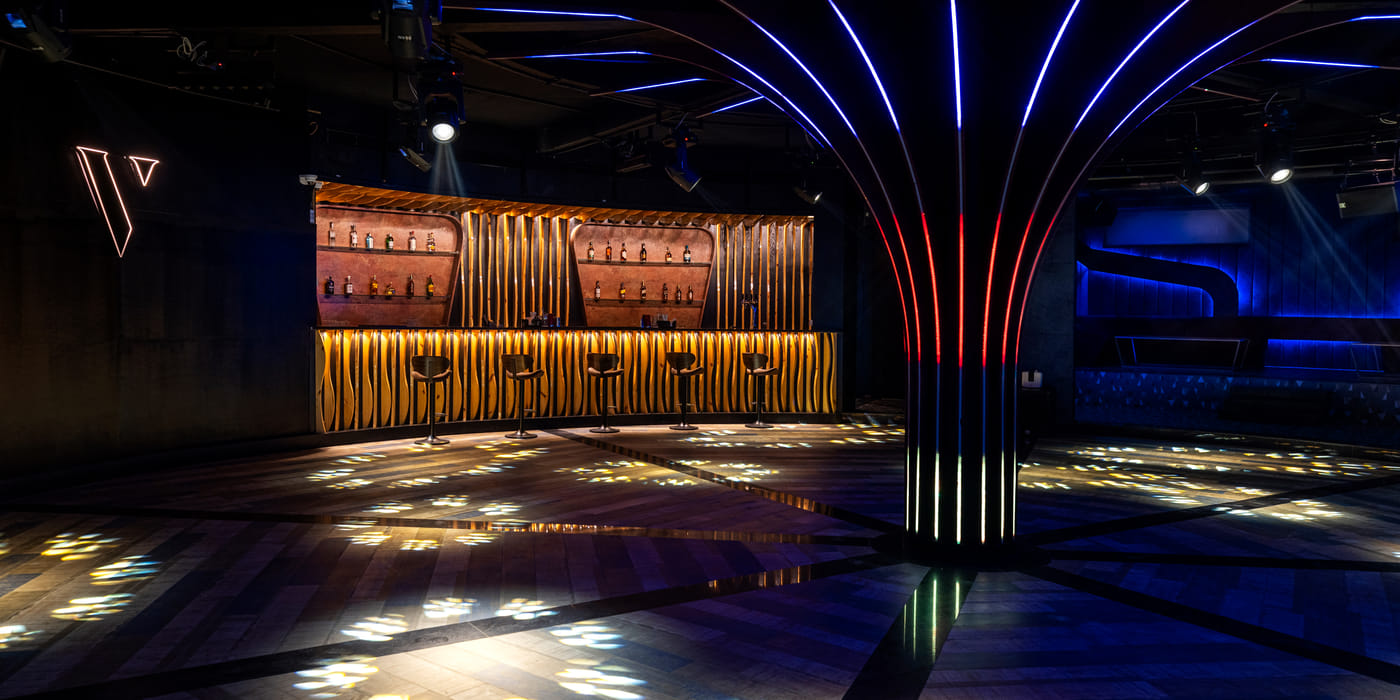 Lit dance floor and DJ booth at The Verve nightclub, Udaipur