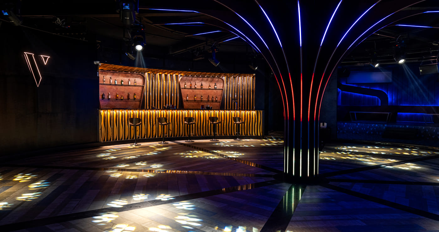 Lit dance floor and DJ booth at The Verve nightclub, Udaipur