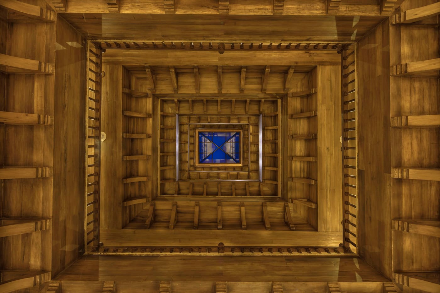 Looking up through the hand-built timber atrium of the Heritage Wing