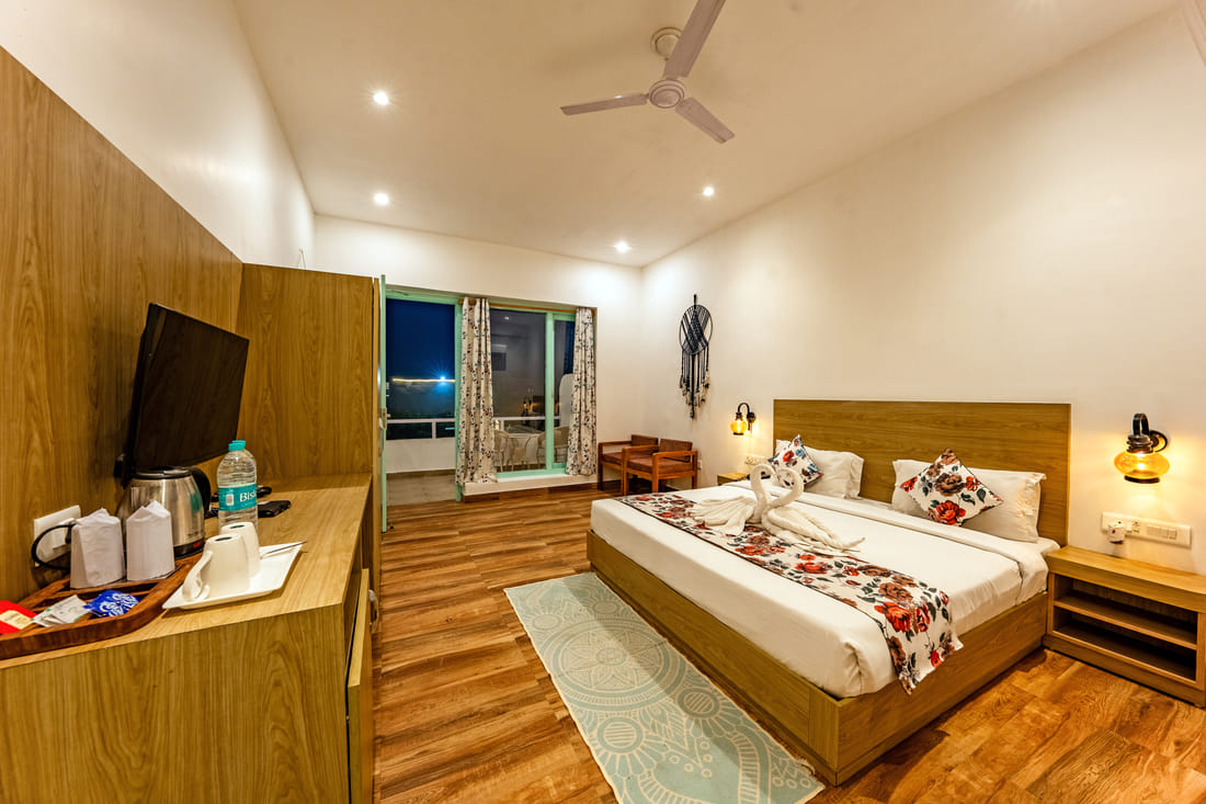 Mountain & Pool View Room seating at Vedikant Resorts The Mallard Corbett