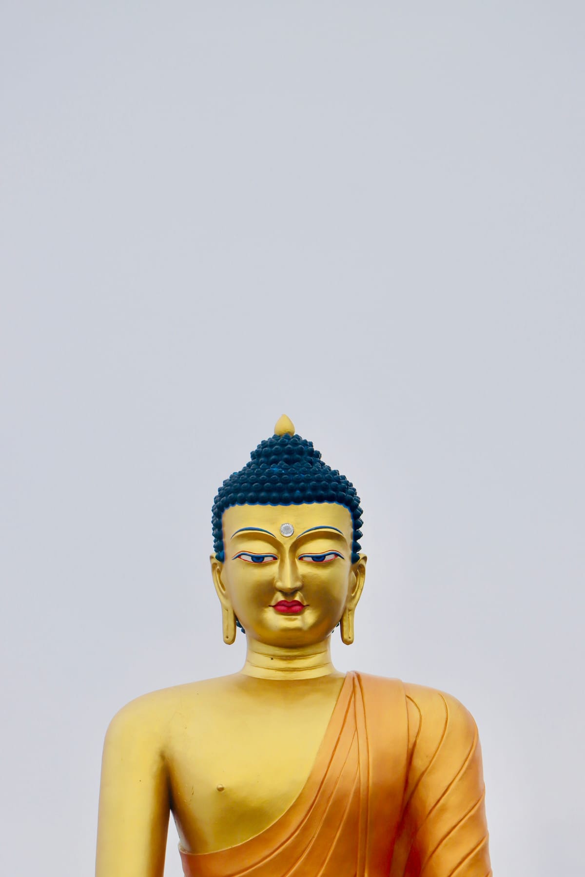 The gilded Buddha figure at the Tsuglagkhang Complex in McLeod Ganj, the temple at the heart of the Tibetan community there