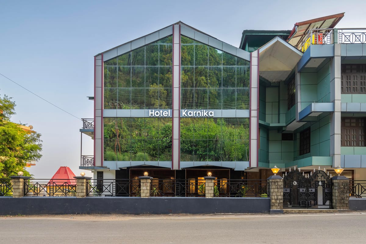 The frontage of Hotel Karnika in Darnu by day, its tall glazed gable