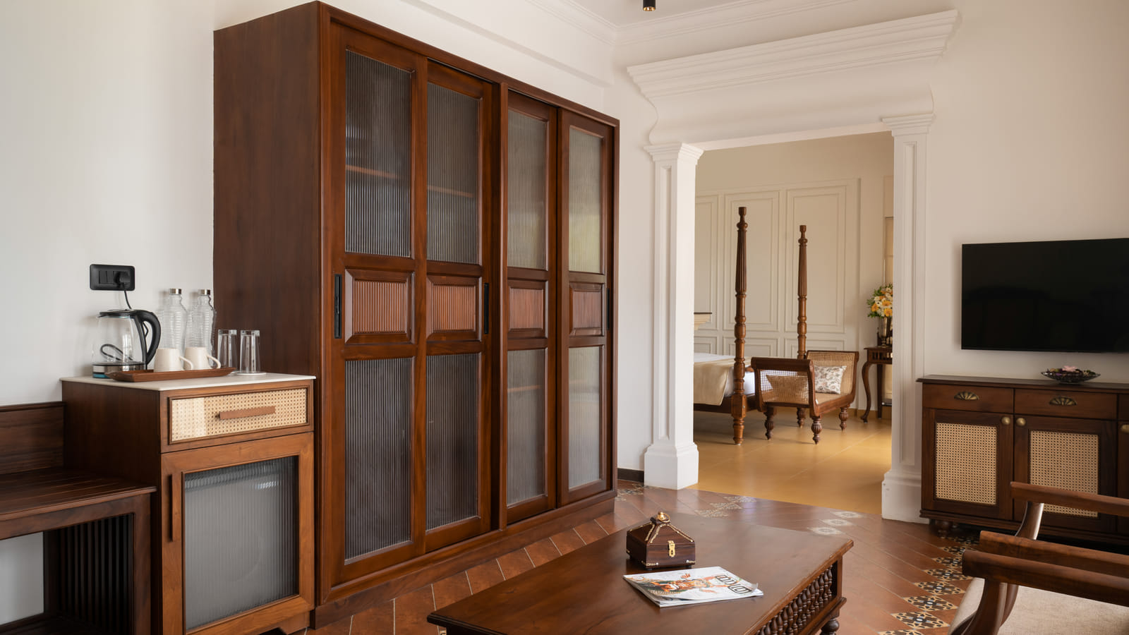 Heritage Suite wooden wardrobe and open minibar counter with tea and coffee tray, Sanskreti