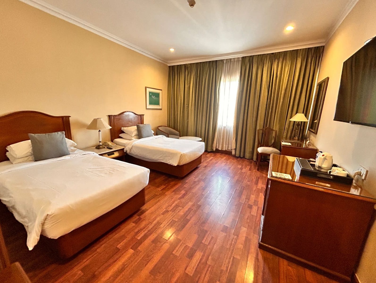 A guest room at The Hans, New Delhi