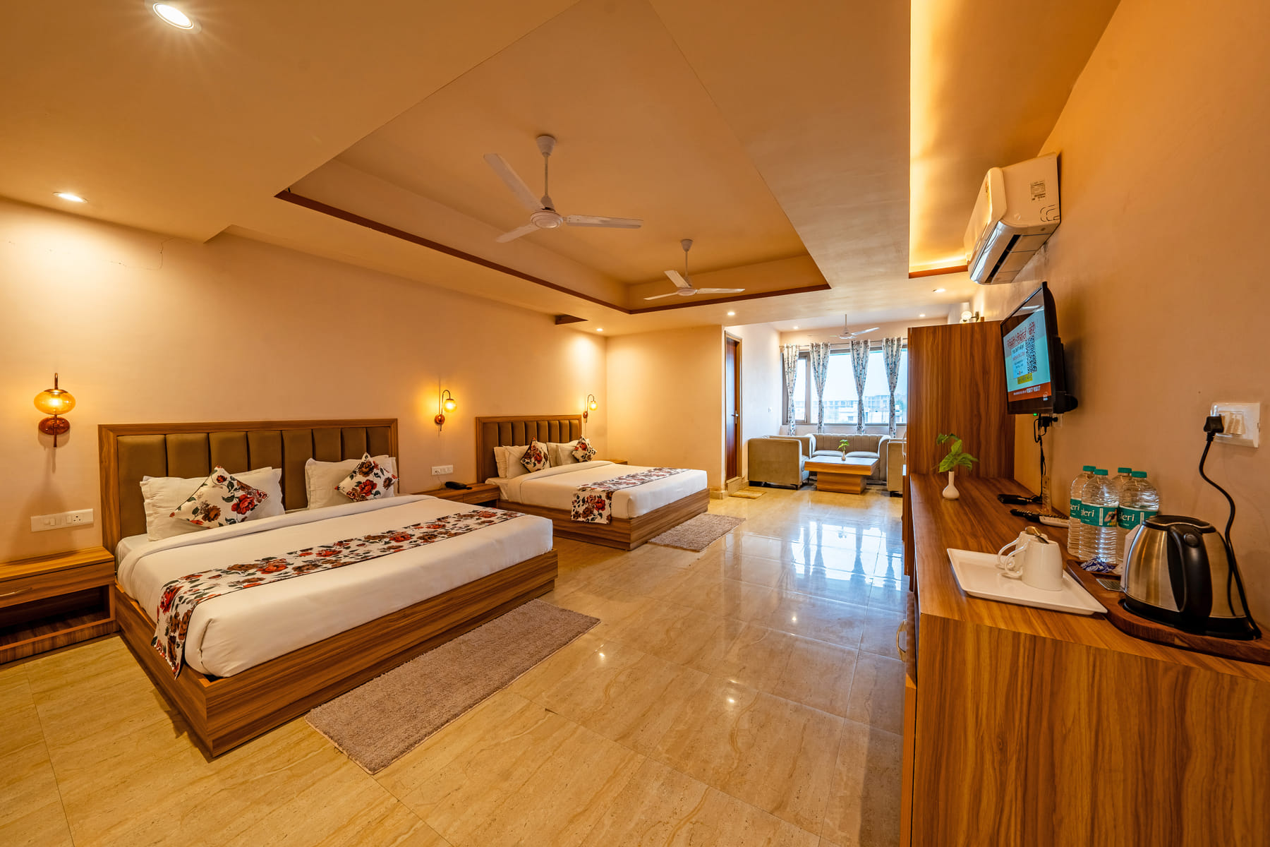 Family Suite with two king beds and sitting area at Vedikant Resorts The Mallard Corbett
