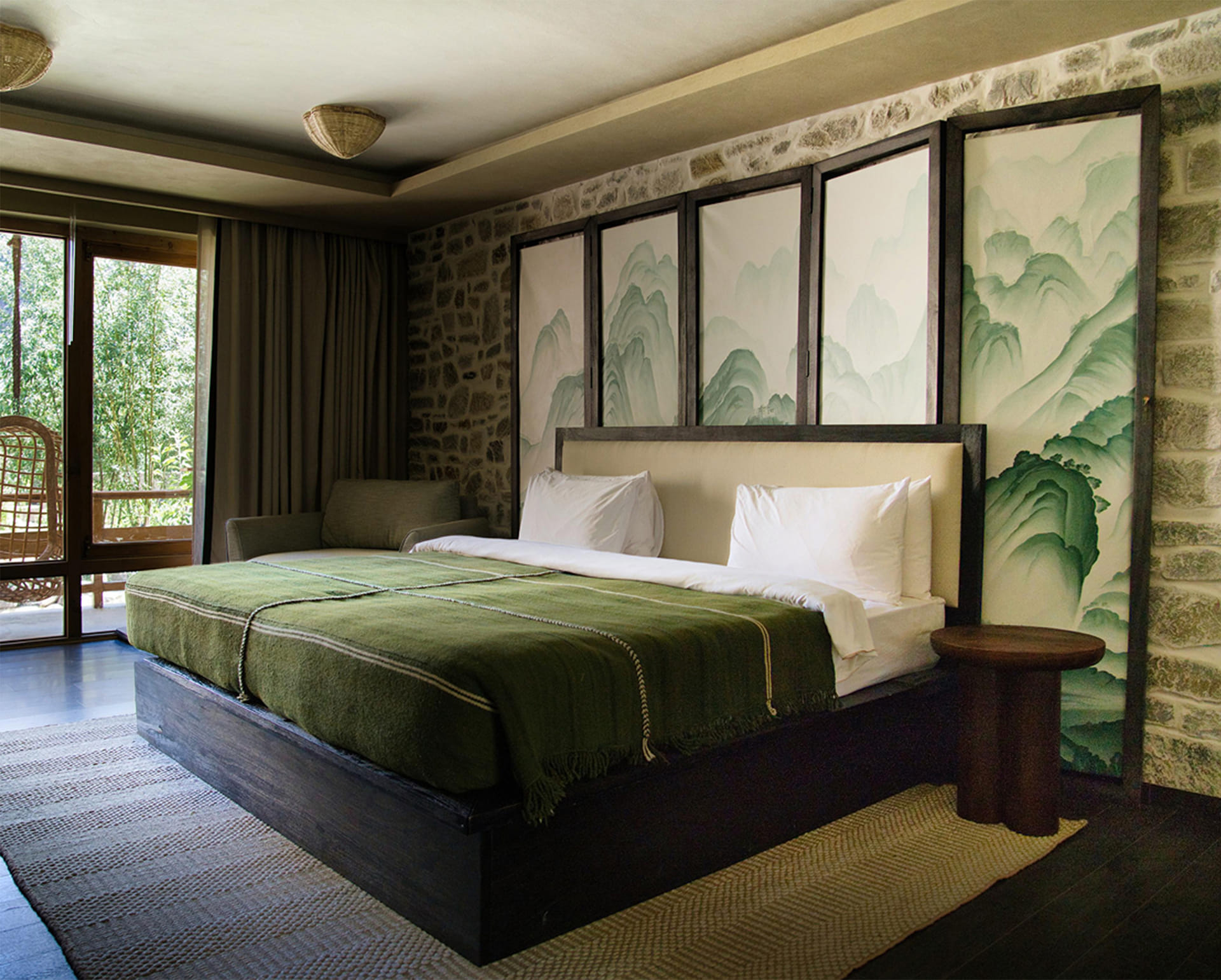 Suite bedroom with mountain mural