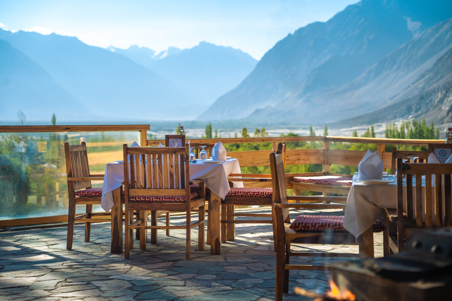 Open-air dining terrace overlooking the Ladakh mountains