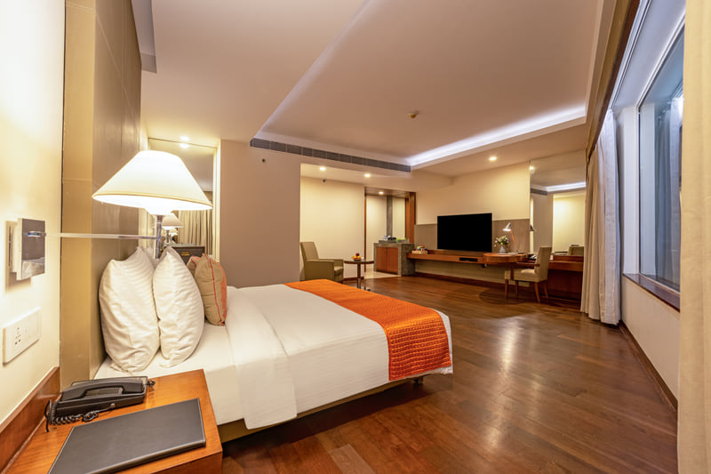 The Anya Suite bedroom and lounge at The Anya Hotel, Gurugram
