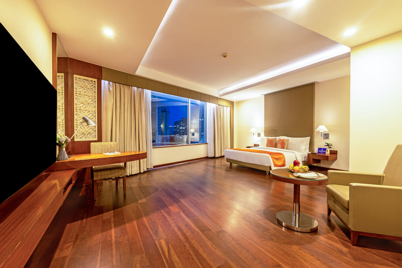 The Anya Suite bedroom at night at The Anya Hotel, Gurugram