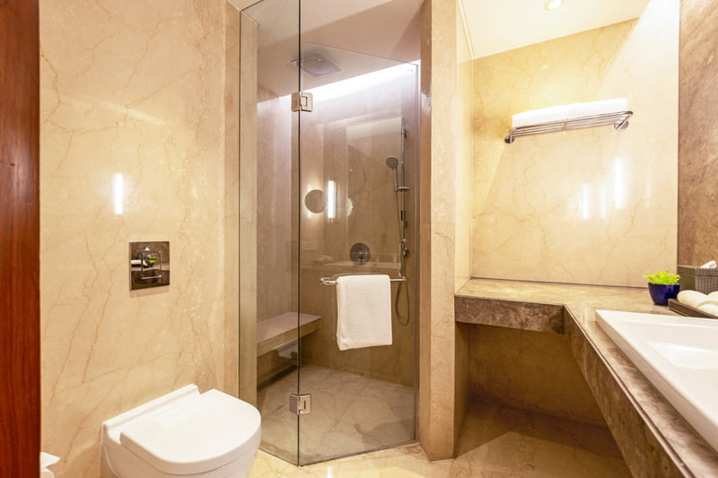 Deluxe Room bathroom at The Anya Hotel, Gurugram