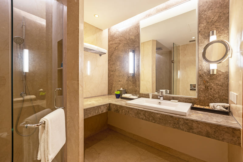 Deluxe Room bathroom vanity at The Anya Hotel, Gurugram