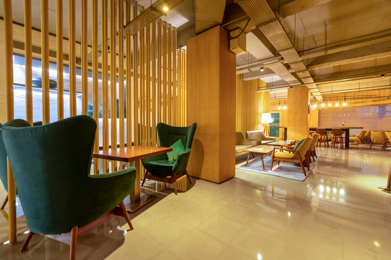 Lounge seating area at The Anya Hotel, Gurugram