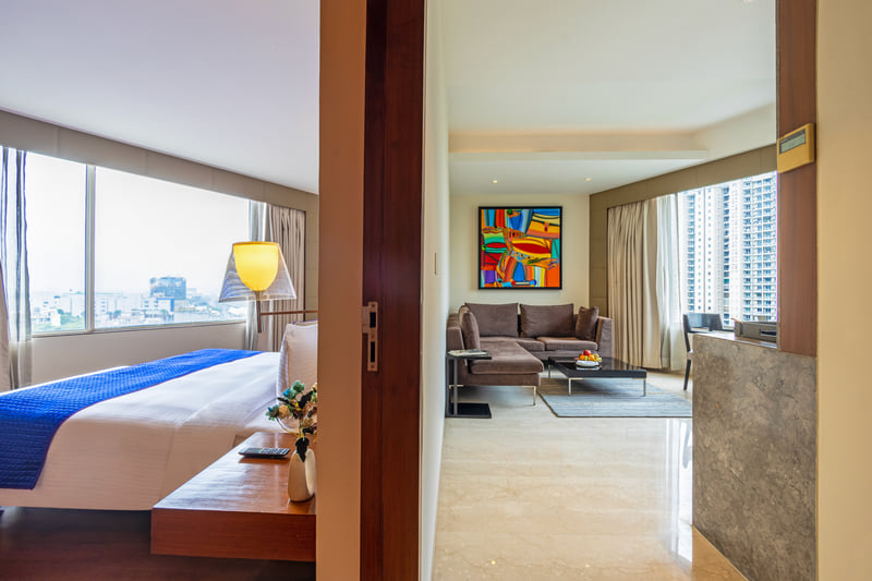 Luxury Suite entrance and living area at The Anya Hotel, Gurugram