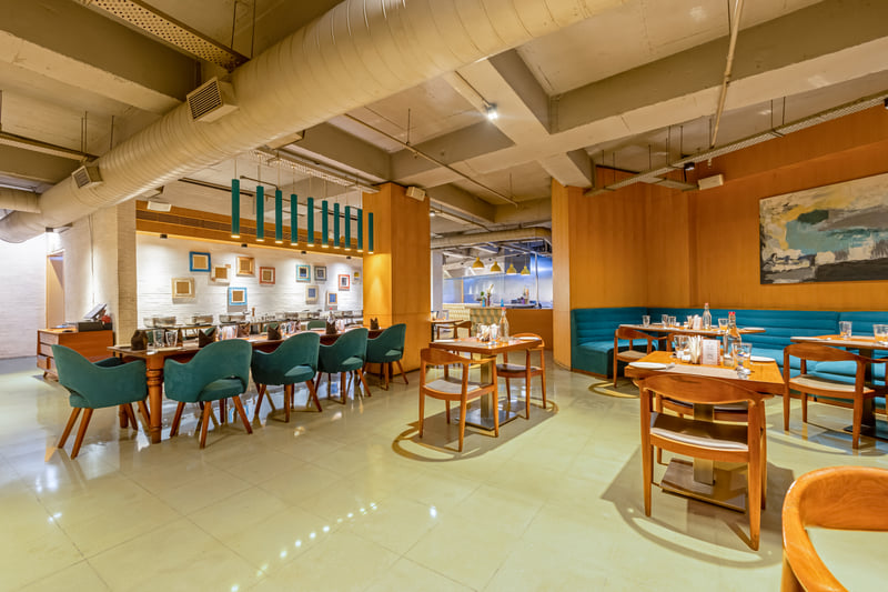 Dining tables set at Naya restaurant, The Anya Hotel