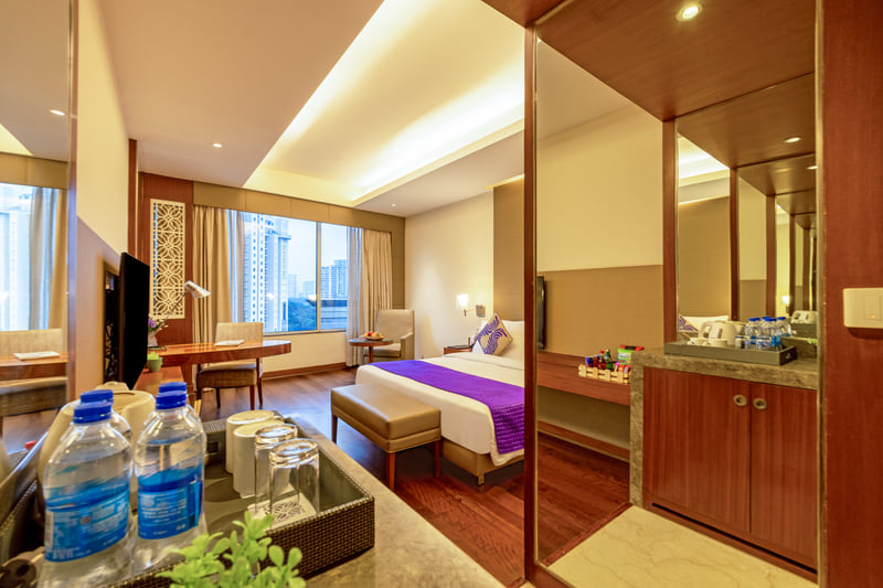 Superior Room entrance and minibar at The Anya Hotel, Gurugram