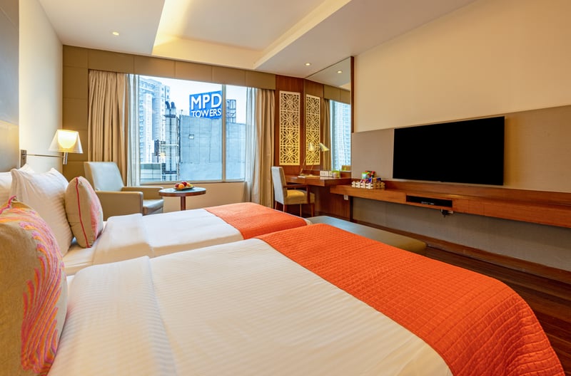 Superior Room twin beds with city view at The Anya Hotel, Gurugram