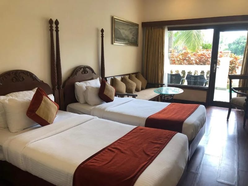 Deluxe room with garden view at The Hans Coco Palms, Puri