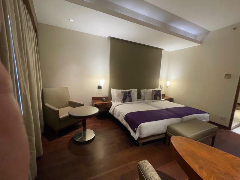 Deluxe Room seating at The Anya Hotel, Gurugram