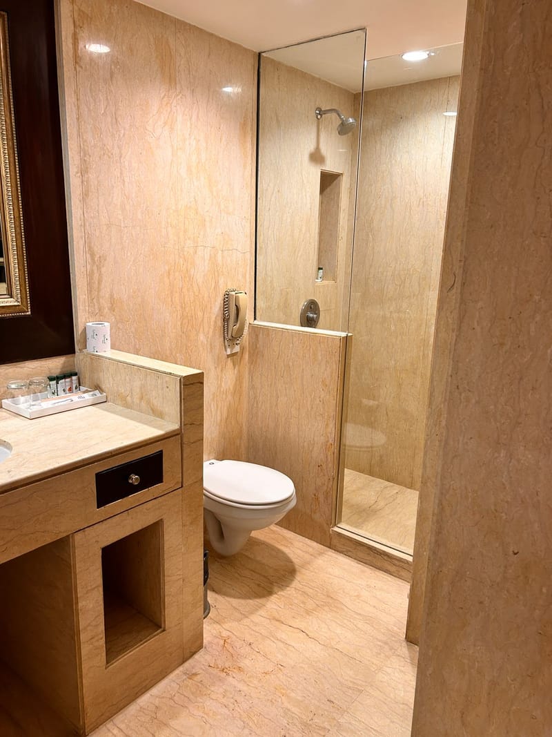 Deluxe Suite bathroom at The Hans, New Delhi