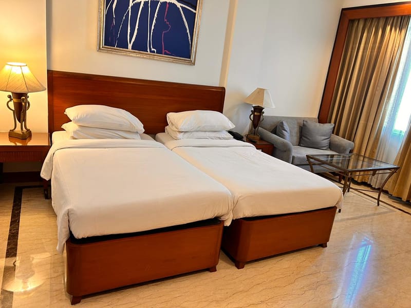 Deluxe Room seating at The Hans, New Delhi