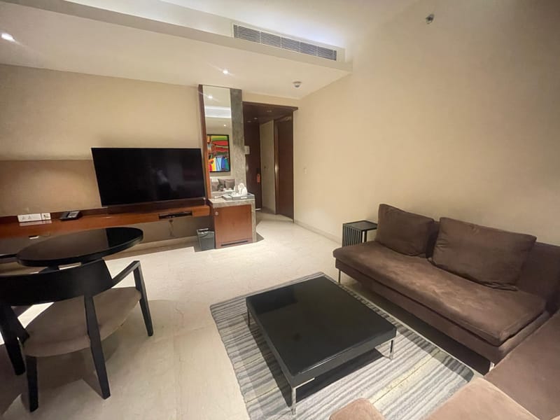 Luxury Suite living space at The Anya Hotel, Gurugram