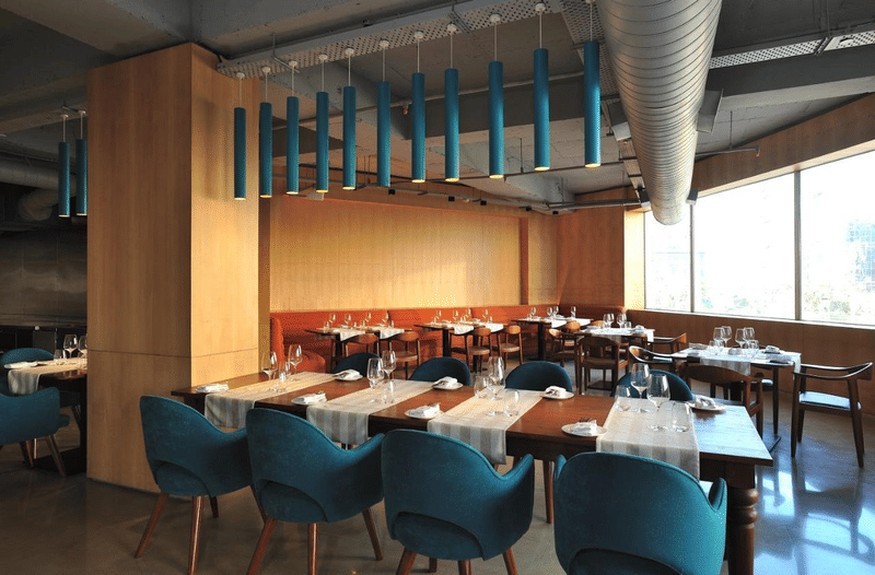 Dining tables set at Naya restaurant, The Anya Hotel