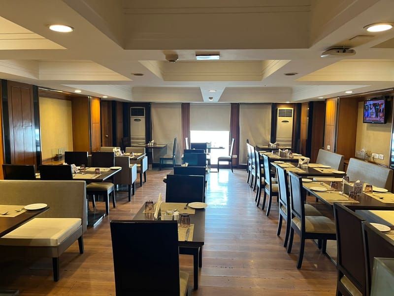 Dining area at Kaffa, The Hans, New Delhi