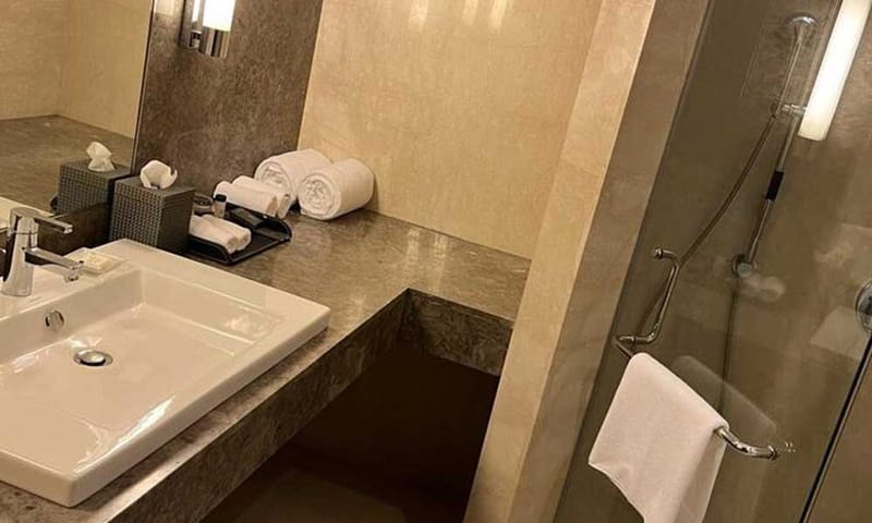 Standard King Room bathroom vanity at The Anya Hotel, Gurugram