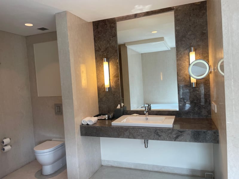 Studio Suite bathroom at The Anya Hotel, Gurugram