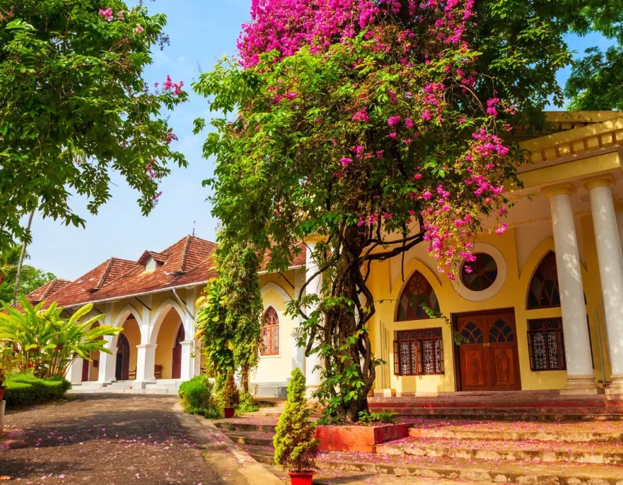 Indo-Portuguese Museum in Fort Kochi — colonial-era stone building set in a walled garden with tiled roof