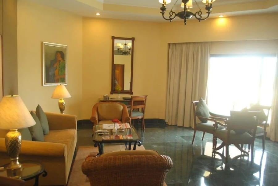 Deluxe Suite living area at The Hans Coco Palms, Puri