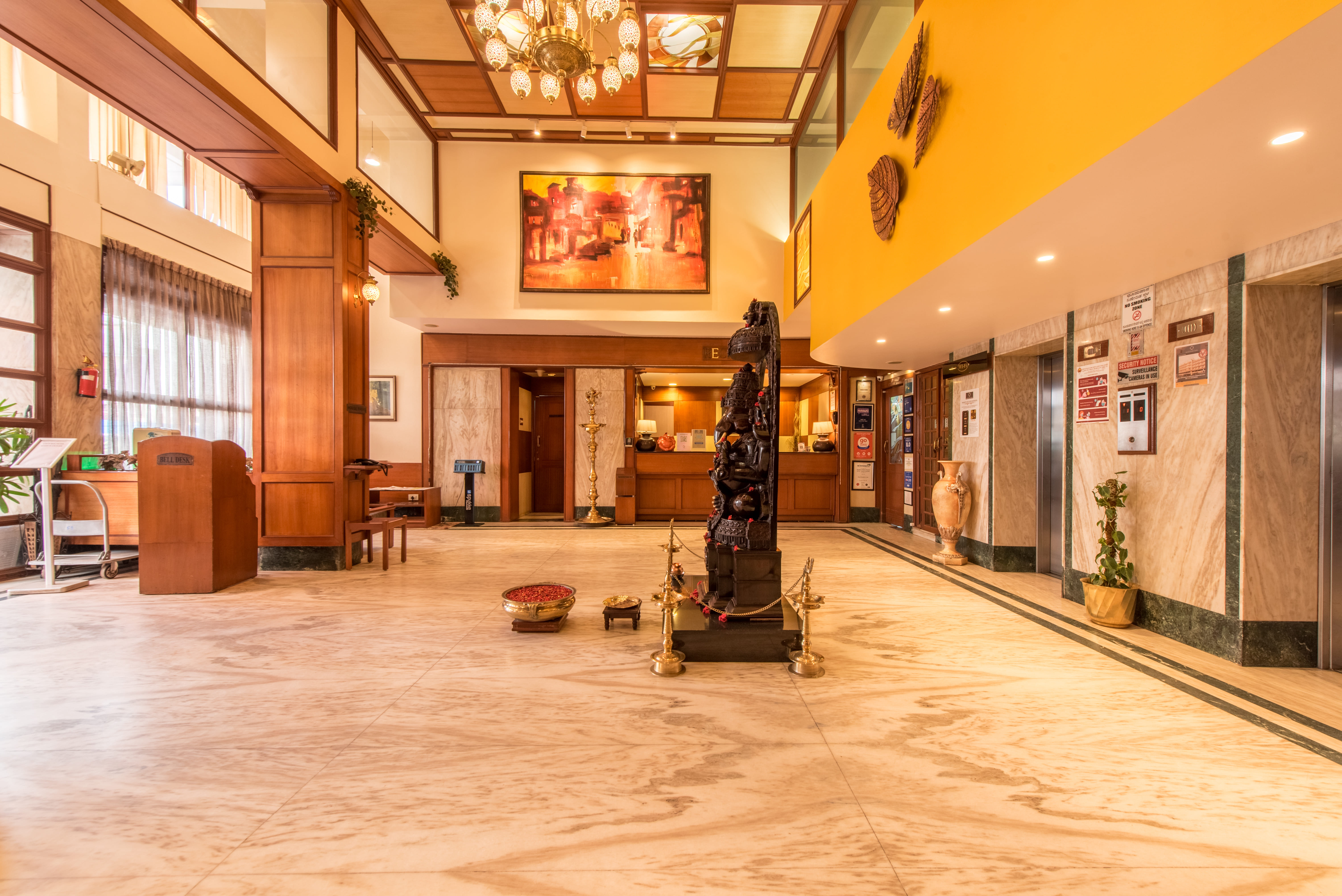 Bangalore Gate Hotel, grand lobby interior with warm lighting and classic décor