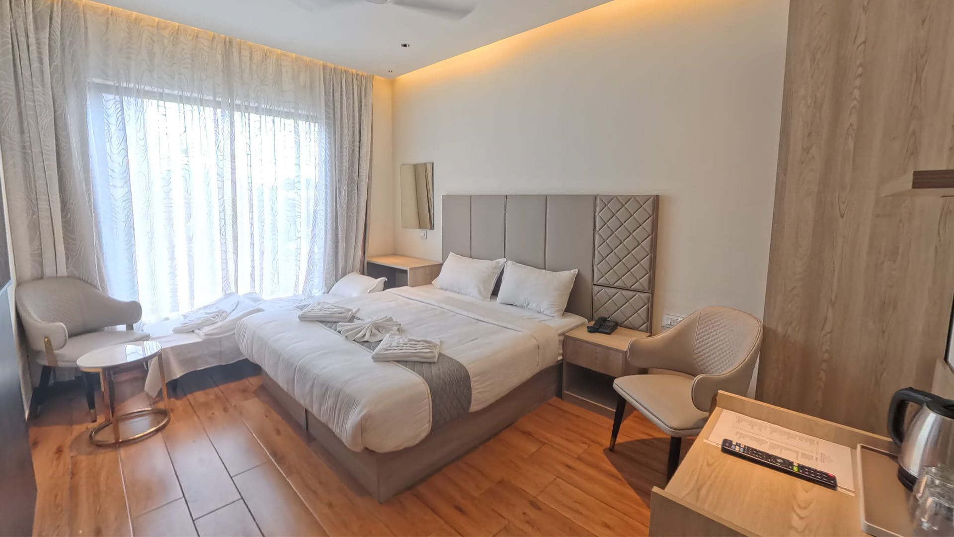 Royal King Room with a king size bed at Hotel Ritvi's Elite