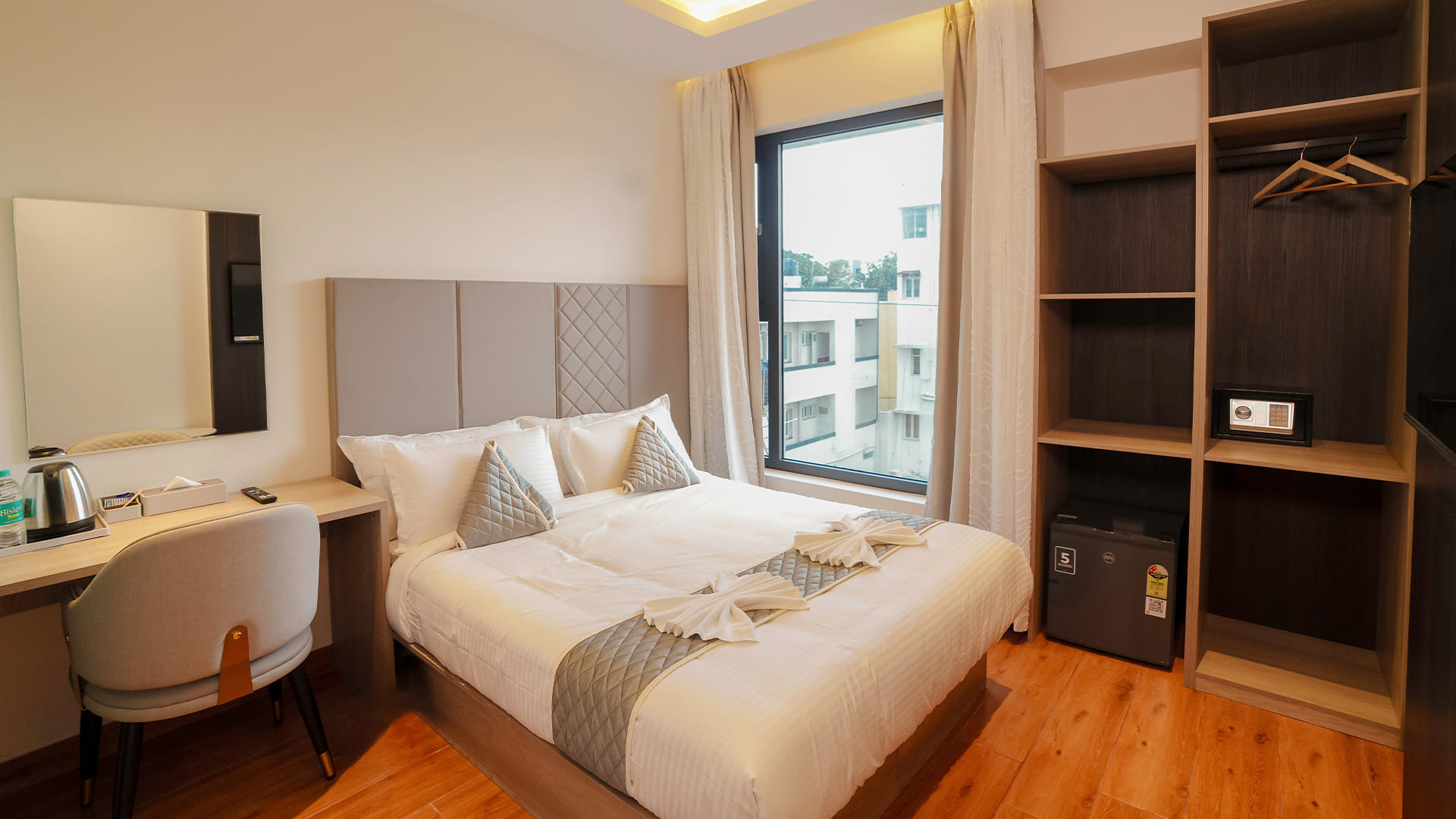 Classic Queen Room with a queen size bed at Hotel Ritvi's Elite