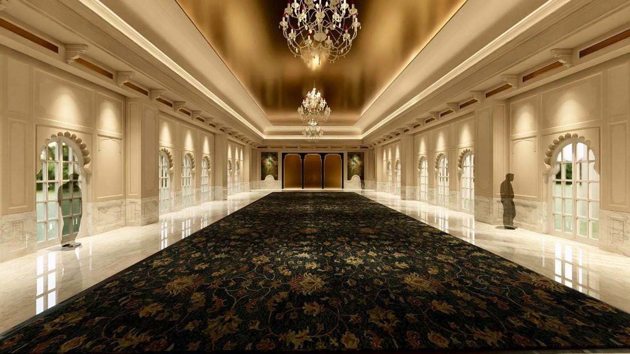 Kingsbury banquet hall with arched windows and a floral patterned carpet