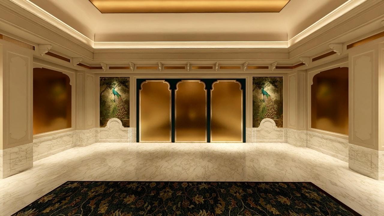 Bespoke banquet stage at Kingsbury with gold panels, a peacock mural and marble flooring