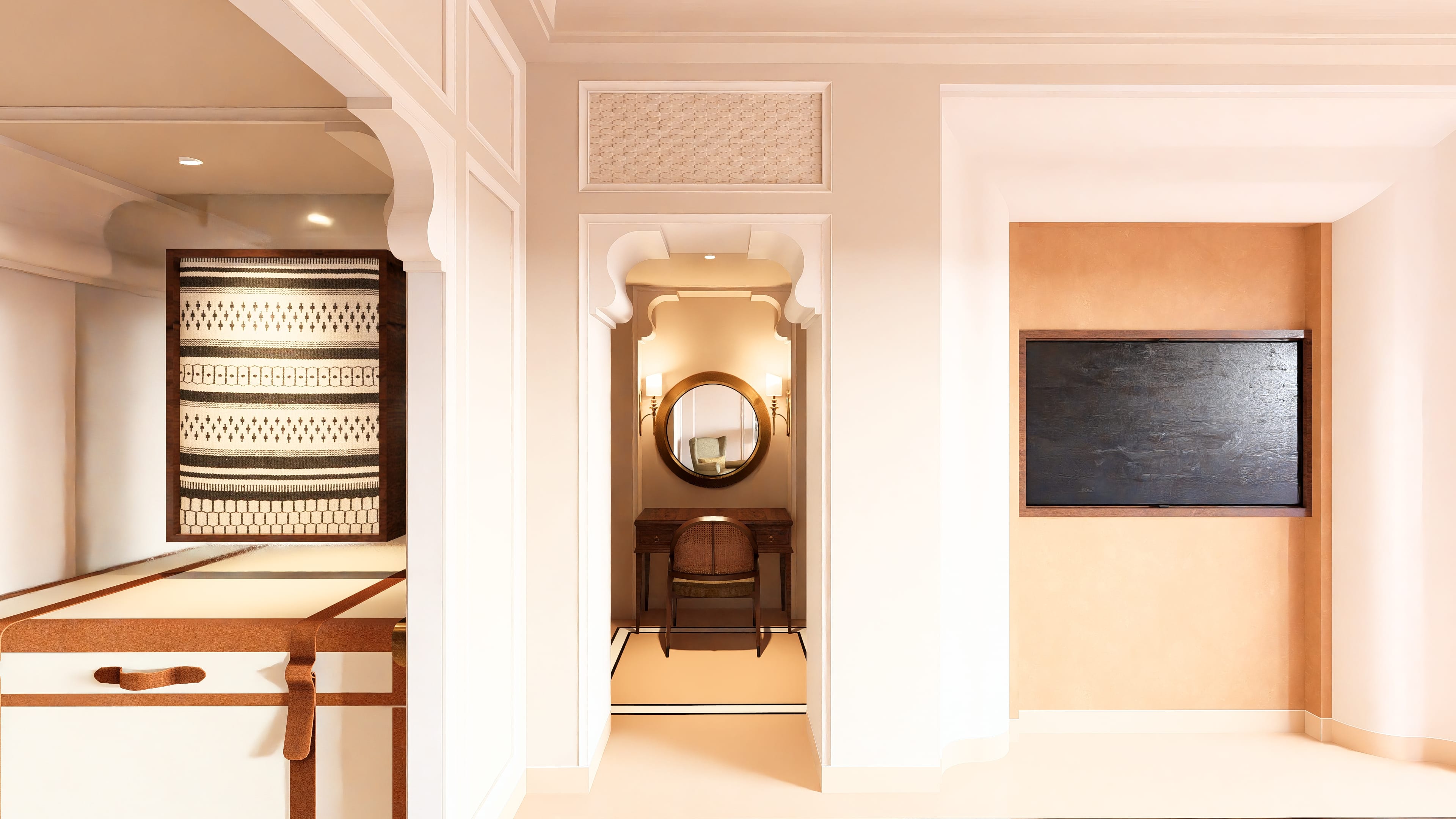 Suite dressing nook with round mirror and woven tapestry detail