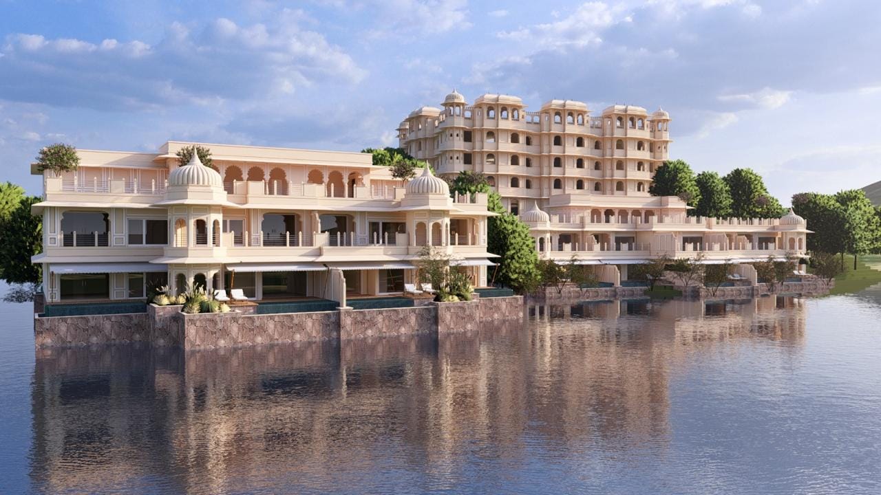 Kingsbury waterfront palace mirrored in the still lake at Udaipur