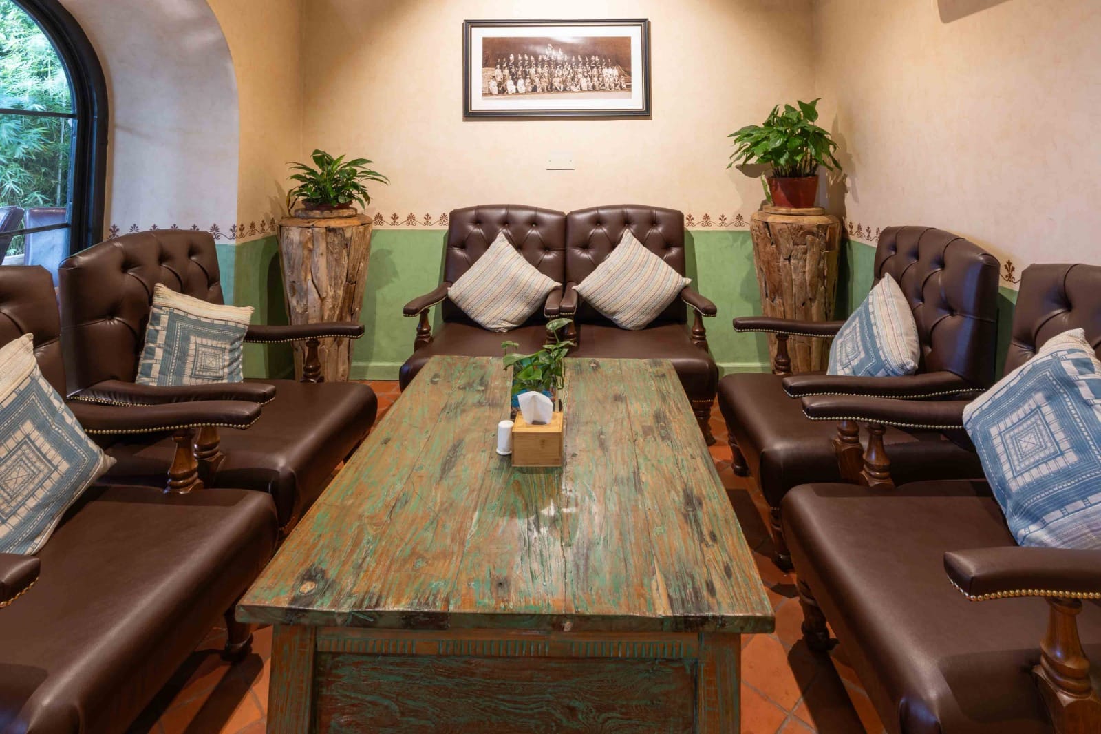 The lounge bar at Chiya Pasal restaurant, Nepali Ghar Hotel, furnished with seating and lighting for guests unwinding after a meal in the garden restaurant.