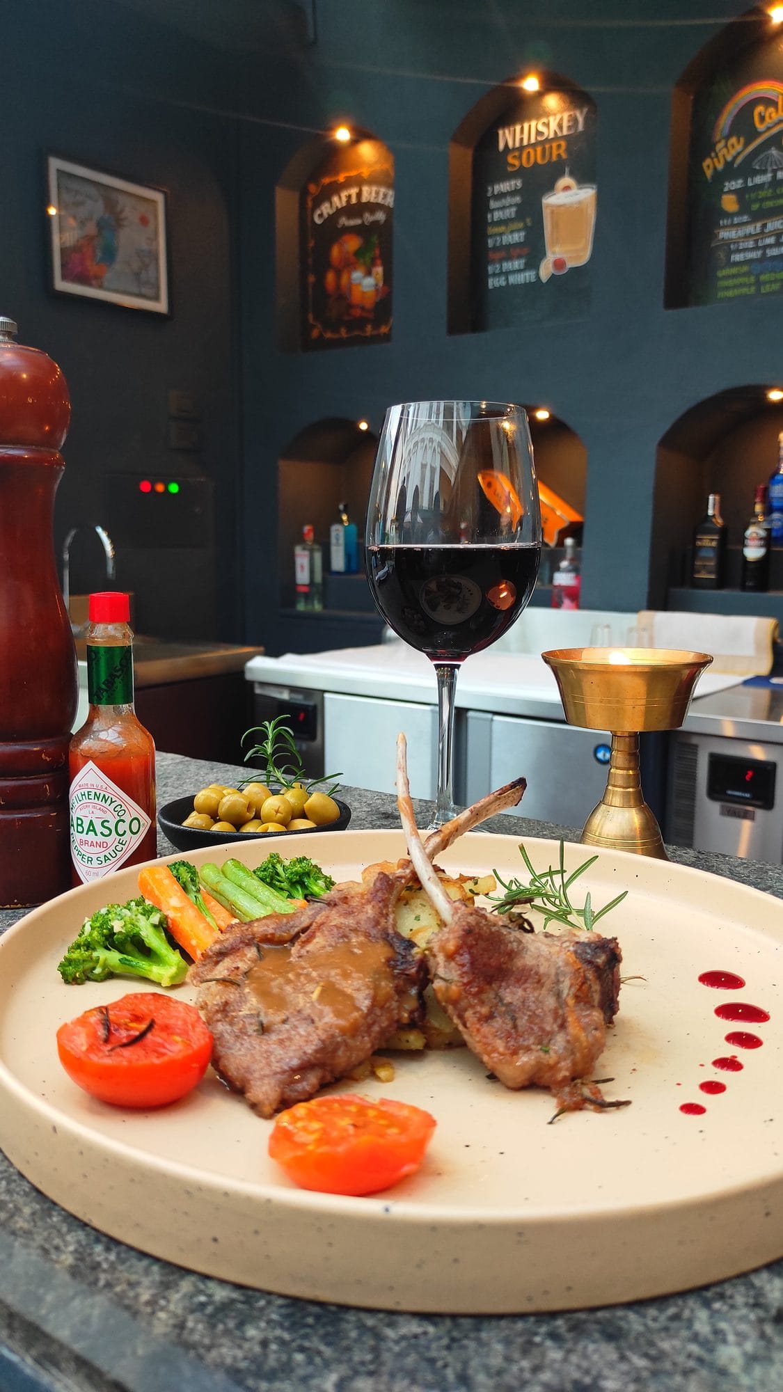 A plate of lamb chops served at Chiya Pasal, the all-day dining restaurant of Nepali Ghar Hotel in Thamel, Kathmandu, part of its multi-cuisine dinner menu.
