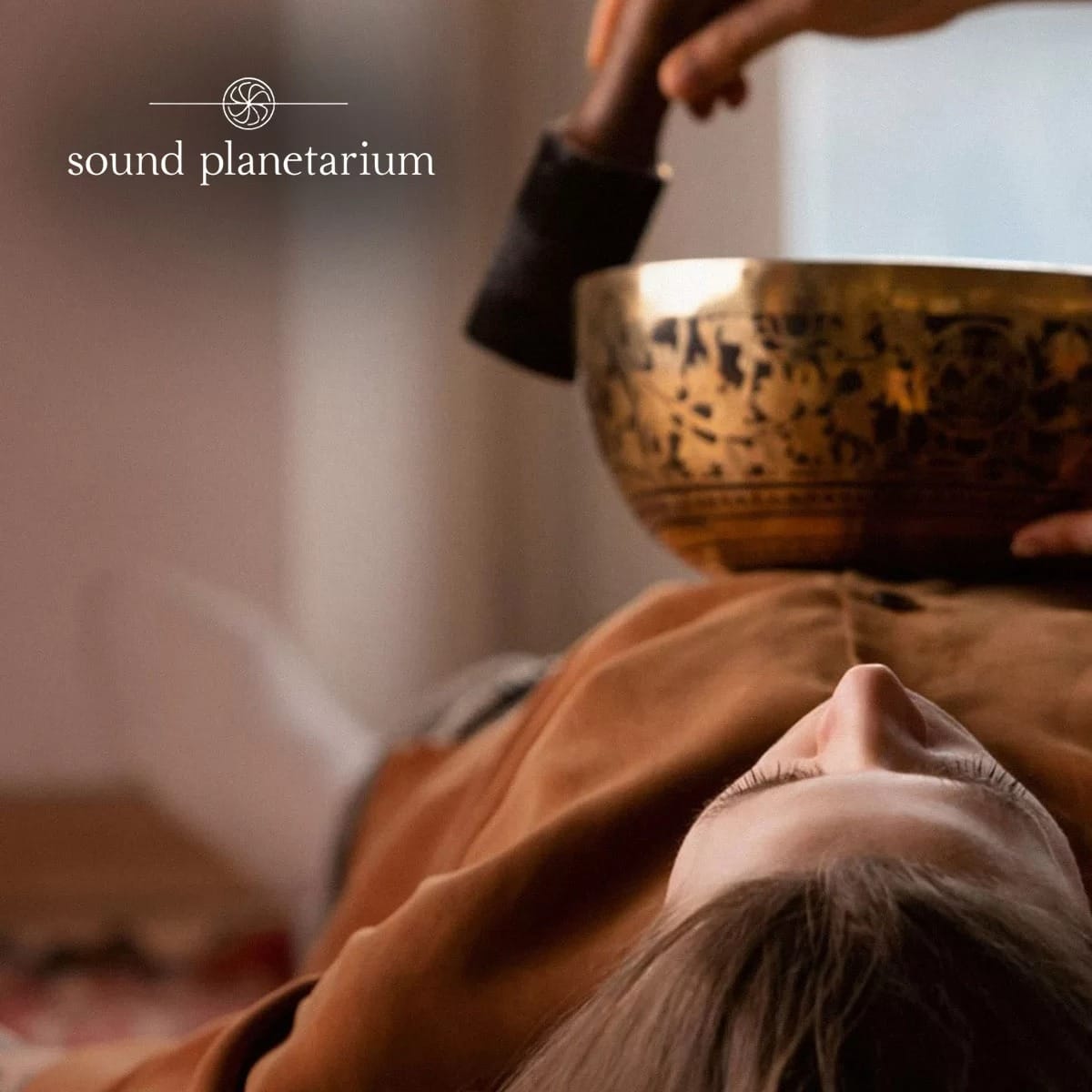 Planet singing bowls arranged for a sound-healing session at the Himalayan Buddhist Meditation Center, part of the wellness programme at Nepali Ghar Hotel.