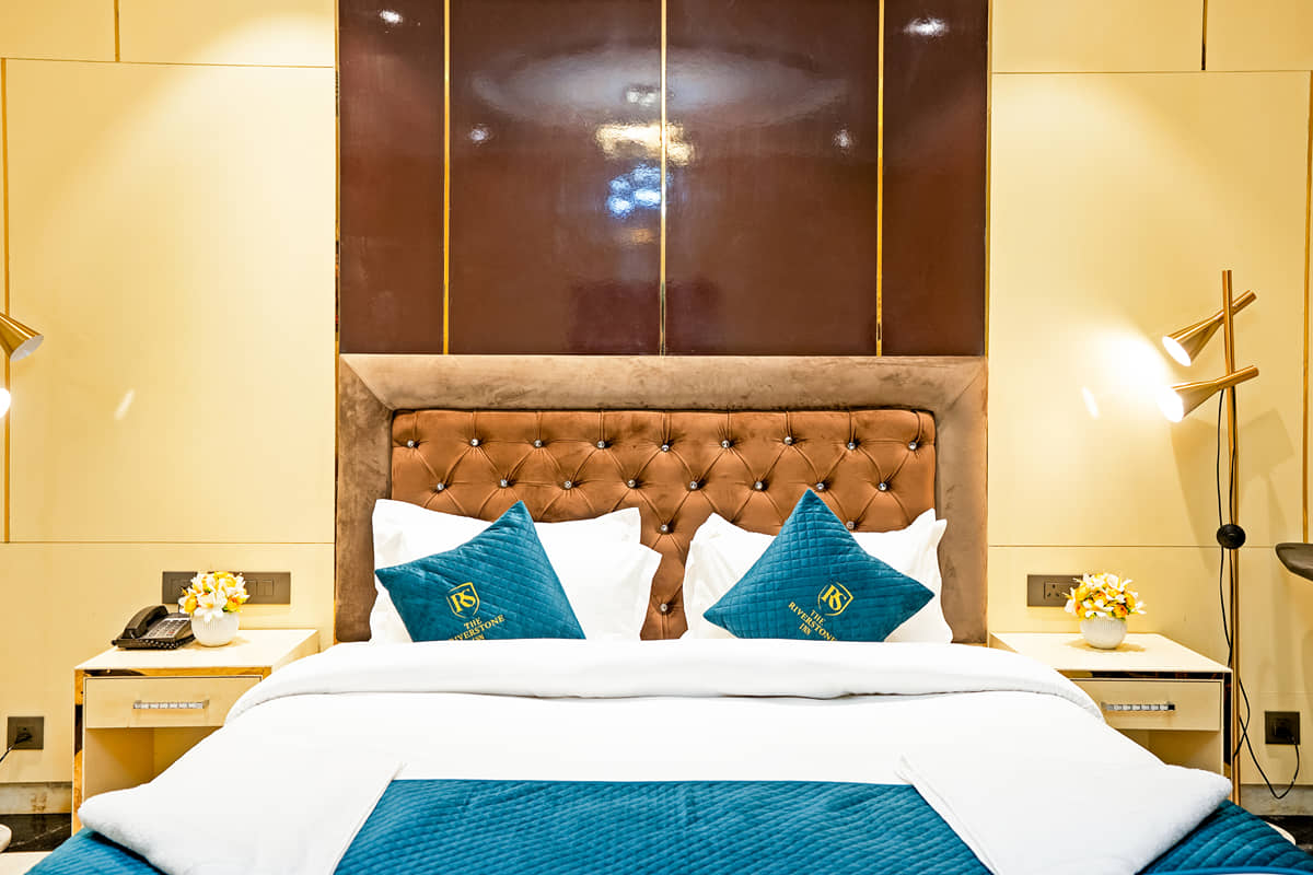 The bed and headboard in the Presidential Suite