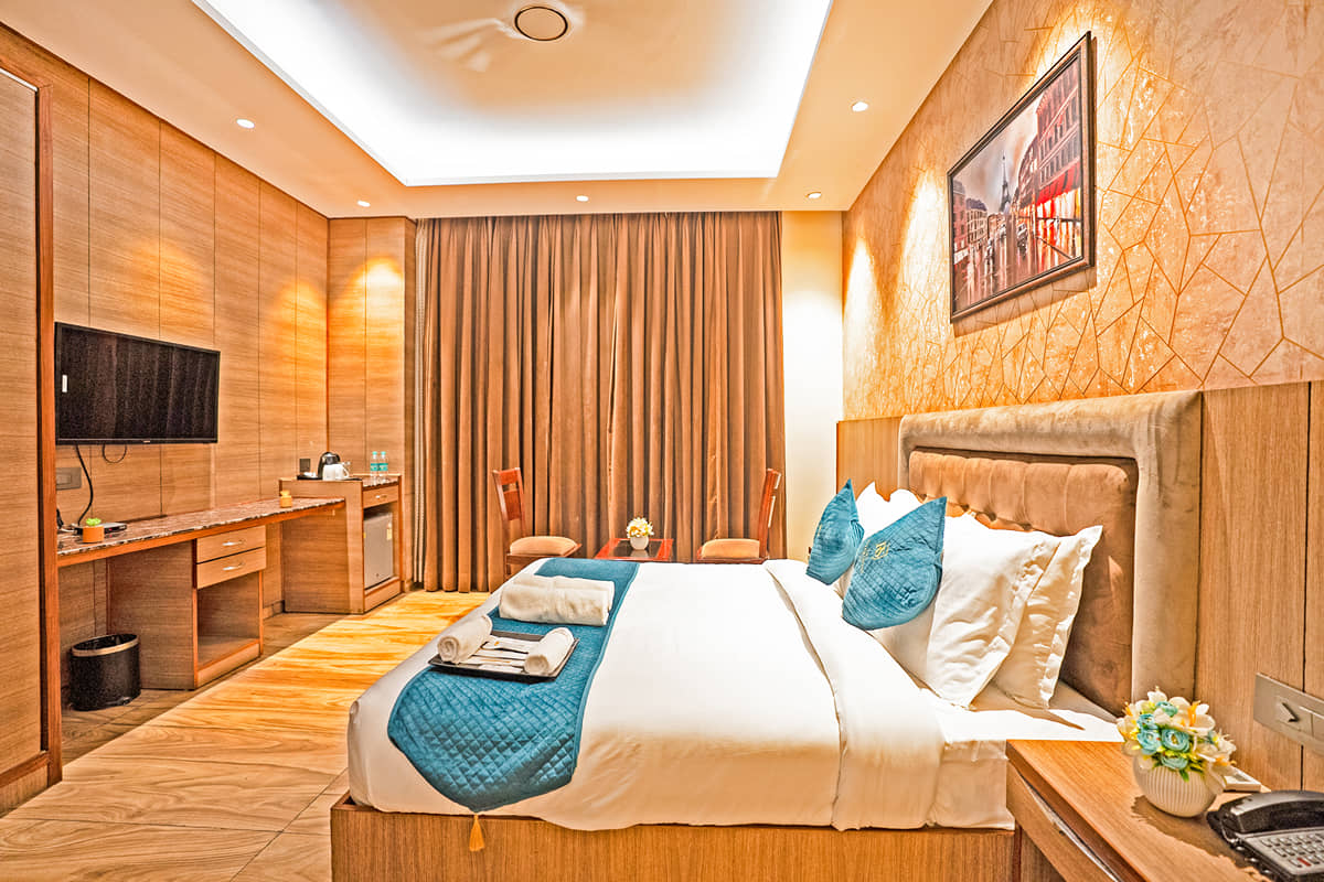 The 42-inch LED television and work desk in a Superior King room
