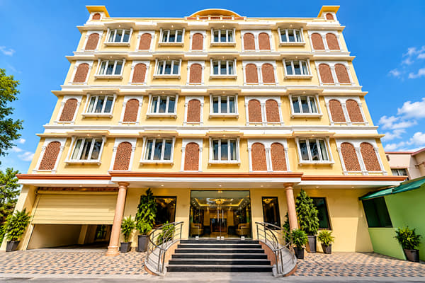 Daytime exterior and main entrance steps of Lime Tree Hotel & Banquet, Jaipur