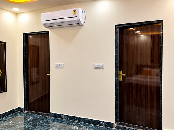Family Suite doors and air conditioner at Lime Tree Hotel, Vrindavan