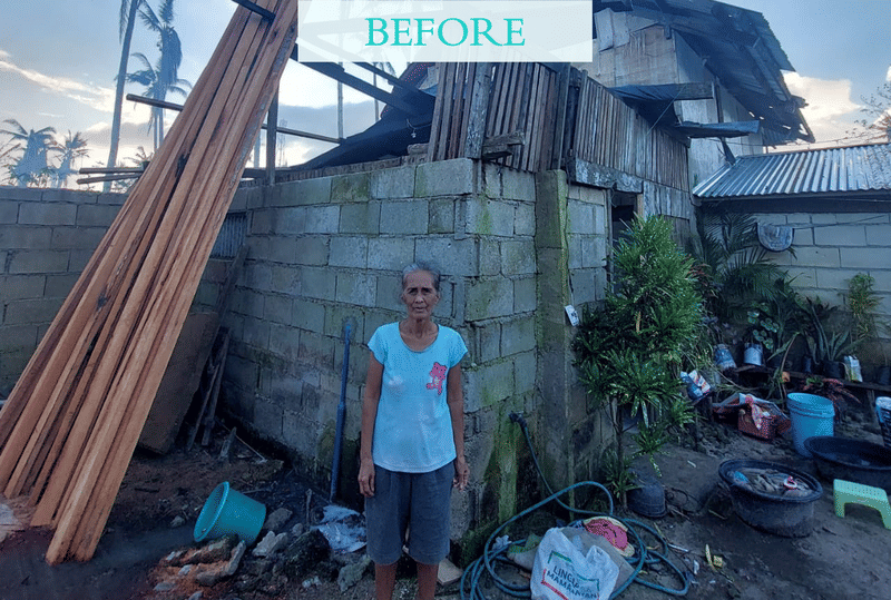An elderly woman stands in front of a damaged concrete block house with wooden planks stacked nearby, with a before label overlaid